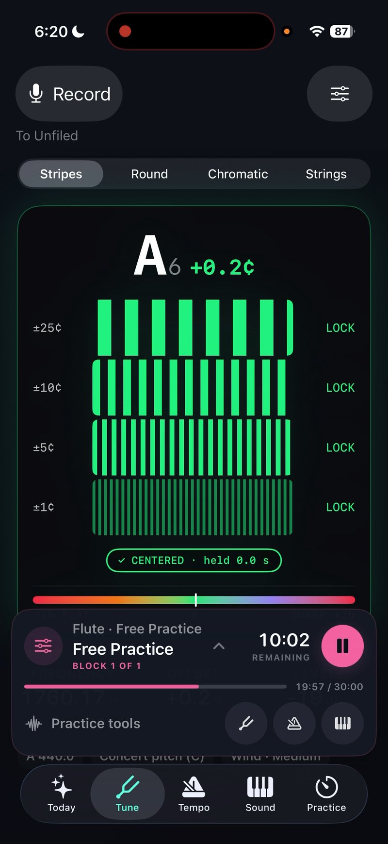 PracticeMode tuner reading A6 with a practice session running underneath